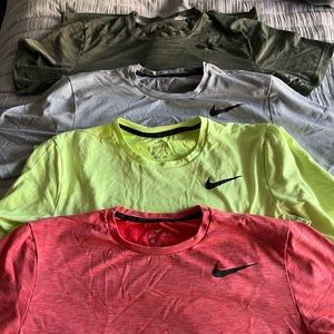 4 Mens Nike short sleeve training shirts. All for $60 or $15 each.